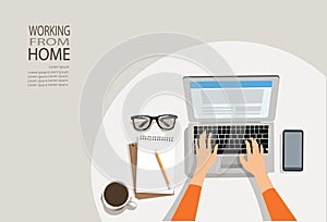 Work from home concept. woman hand using laptop with copy space of white working table with lnote book, pencil, smartphone, cup of