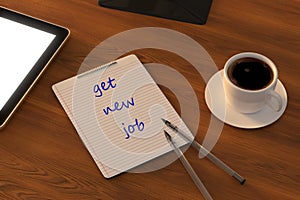 Work from home. desk office with laptop, blank notepad, coffee cup and pen on wood table. Top view copy space