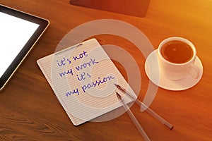 Work from home. desk office with laptop, blank notepad, coffee cup and pen on wood table. Top view copy space