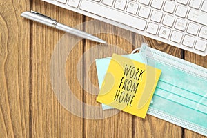 Work from home for quarantine times in Coronavirus Covid-19 pandemic outbreak background concept. Mockup sticky note on wooden