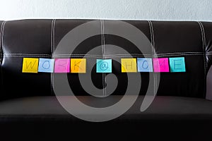 work at home sticky note on home sofa