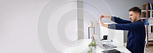 Stretch Exercise At Computer Desk