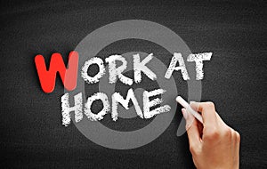 Work at home text on blackboard