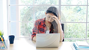 Work from home, Young asian woman struggle with laptop computer, Frustrated asia girl looking at laptop while studying online