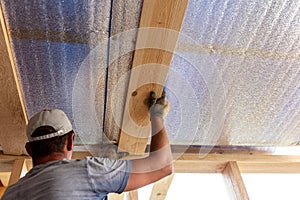 Work insulates the ceiling in the room