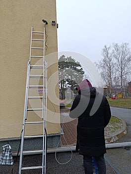 Work ladder cctv camera worker engineer