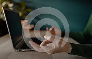 Work Life Balance Concept. Woman sitting on Desk and making the Meditation while Working on Computer Laptop. Mental Health and .