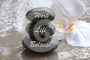 Work life balance text engraved on stones. New ways of working culture. Conceptual.