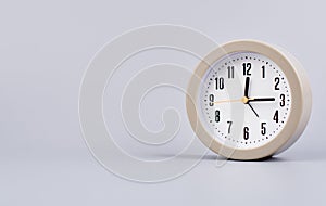 work in daily life Photo of a modern clock in a high quality photo studio