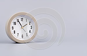 work in daily life Photo of a modern clock in a high quality photo studio