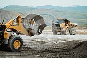The work of mining machinery.