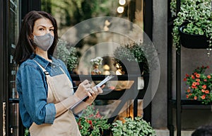 Work in modern plant store or greenhouse during lockdown