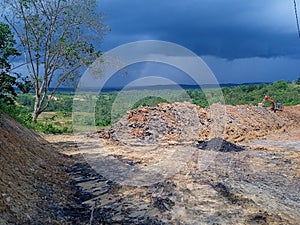 work at mountain with exavator