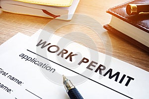 Work permit application on a table.