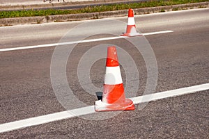 Work on road. Construction cones. Traffic cone, with white and o