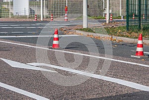 Work on road marking with pylons