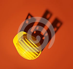 Work safety helmet casting a shadow of buildings