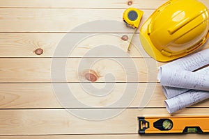 Work safety. Standard Construction site protective equipment on top view wooden background, flat lay, copy space,safety first