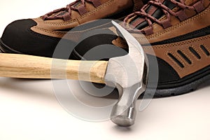 Work shoes and hammer