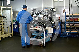 Work on a site of subassembly of automobile engines. Assembly sh