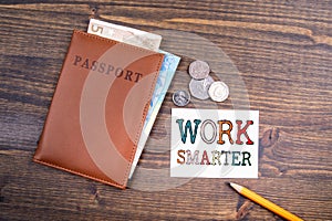 Work smarter. Euro money and British coins with passport
