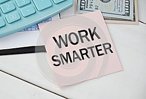 work smarter text on a blue card on the background of reports