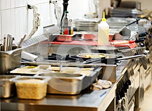 Work surface and kitchen equipment in professional kitchen