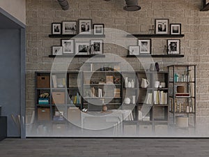 Work table or design workbench in an office interior with a large bookshelf on the wall filled with binders, magazines