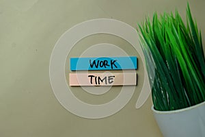 Work Time write on sticky notes isolated on office desk