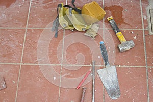 Work tools leaning on the pavement ready to be used