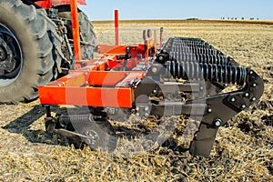 Work of the trailed unit for tillage in the field