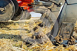 Work of the trailed unit for tillage in the field