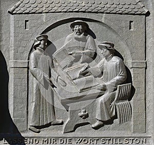 Work on the translation of the Bible, from left: Leo Jud, Theodor Bibiliander and Zwingli, Grossmunster church in Zurich