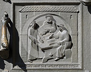 Work on the translation of the Bible, from left: Leo Jud, Theodor Bibiliander and Zwingli, Grossmunster church in Zurich photo