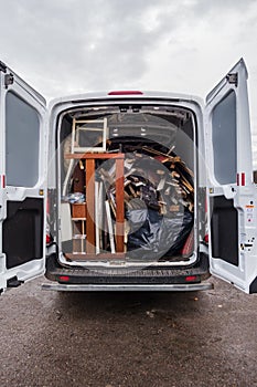Work van full of debris and on its way to recycling