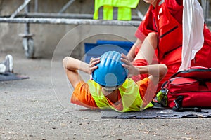 Work or workplace accident at construction site. First aid and CPR training.