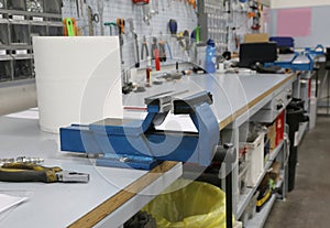 Workbench of a workshop and a vise
