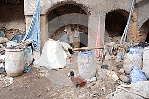Worker at ancient tannery in Fez