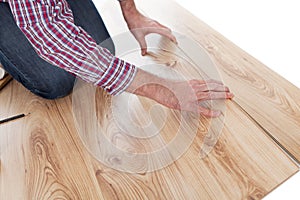 Worker assembling laminate floor