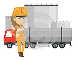 Worker on background of fuel truck and oil plant.