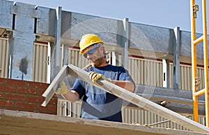 Worker Bending Metal