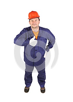 Worker in blue uniform showing thumbs up.