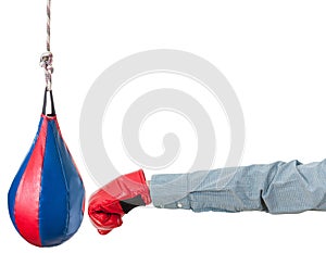 Worker with boxing glove punches punching bag