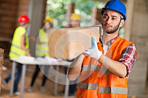 Worker bring construction beam