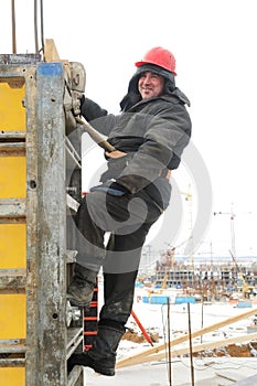 Worker builder at construction site