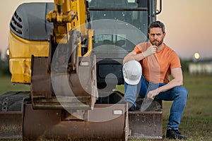 Worker at building site. Construction manager in helmet. Male construction engineer. Architect at a construction site