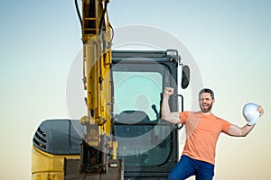 Worker with bulldozer on site construction. Man excavator worker. Construction driver worker with excavator on the