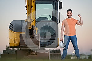 Worker with bulldozer on site construction. Man excavator worker. Construction driver worker with excavator on the