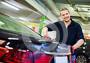 Worker on a car wash