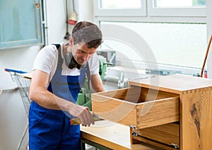 Worker in a carpenters workshop
